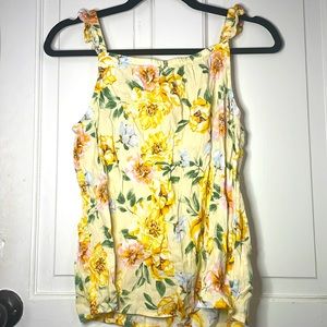 A yellow tank with flowers for girls that fit in an XXL/18 kids